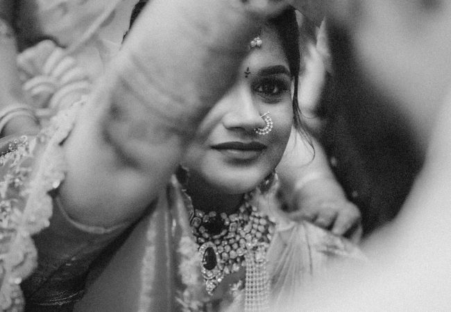 The Frames Nest wedding photographers in Bangalore, Karnataka, specializing in candid, traditional and cinematic wedding photography.